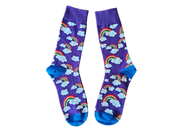 A pair of purple socks with a pattern of rainbows and fluffy clouds.