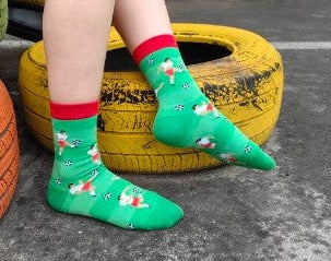 Kids crew socks with soccer player print on model