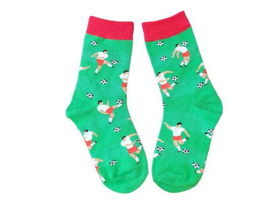 Green and red soccer socks for kids – children’s size 13–3 laid flat.