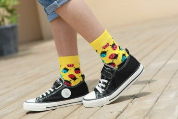 Cute crew socks for kids with ladybug print on sock model
