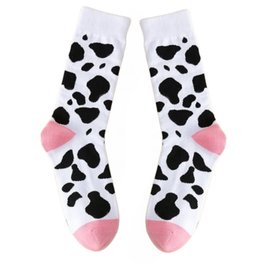 Cow print socks with pink heels, available in unisex medium and large
