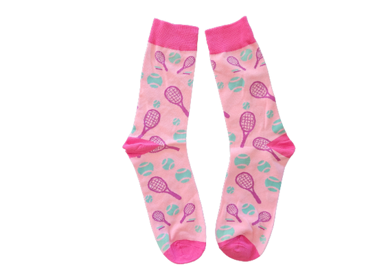 Pink crew socks with tennis rackets and balls on white background