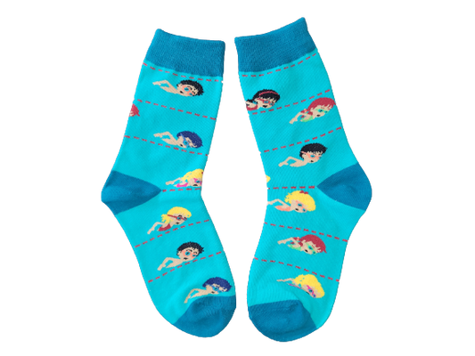 Blue kids socks with swimmer design – size small laid flat.