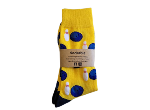 Ten pin bowling socks laid flat with label ready for gifting or fundraising